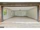 Spacious garage featuring brick accents, windows, and ample room for parking and storage at 1124 Ponderosa Park Dr, Forest Park, GA 30297
