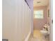 Clean bathroom with shower and toilet at 130 Laurel Lake Rd, Tyrone, GA 30290
