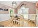 Charming dining room with natural light and an adjacent view of the exterior at 130 Laurel Lake Rd, Tyrone, GA 30290