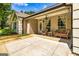 Inviting front porch featuring comfortable seating perfect for relaxation at 130 Laurel Lake Rd, Tyrone, GA 30290