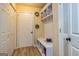 Functional mudroom with built-in storage, a bench, and convenient coat hooks at 130 Laurel Lake Rd, Tyrone, GA 30290