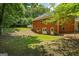 Brick home featuring a finished basement with walkout and large backyard, perfect for outdoor activities at 40 Costleys Bridge Dr, Oxford, GA 30054