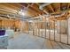Unfinished basement ready to be customized with exposed beams and concrete floors at 40 Costleys Bridge Dr, Oxford, GA 30054