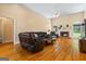 Bright living room with hardwood floors, fireplace, and comfortable seating at 40 Costleys Bridge Dr, Oxford, GA 30054