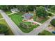 Aerial view of home with pool, lovely landscaping, and a spacious yard in a residential neighborhood at 15 Livingston Way, Covington, GA 30016