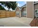 The backyard has a concrete patio and wood privacy fence that offers a great outdoor space for entertaining or relaxing in the sun at 15 Livingston Way, Covington, GA 30016