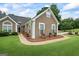 Lovely single-story home with neutral siding, complemented by manicured landscaping and flower boxes at 15 Livingston Way, Covington, GA 30016