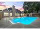 Inviting backyard pool with ample deck space perfect for relaxation and entertaining at 15 Livingston Way, Covington, GA 30016