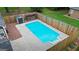 Inviting backyard pool with ample deck space perfect for relaxation and entertaining at 15 Livingston Way, Covington, GA 30016