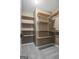 Spacious walk-in closet with ample shelving and storage space at 15 Livingston Way, Covington, GA 30016