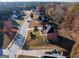 Aerial view of a charming neighborhood with tree-lined streets and well-maintained homes at 355 Woodbyne Dr, Fayetteville, GA 30214