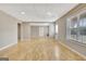 Unfurnished basement with laminate flooring and access to an exterior door at 355 Woodbyne Dr, Fayetteville, GA 30214
