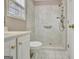 Updated bathroom with a marble tile shower, modern fixtures, and a clean aesthetic at 355 Woodbyne Dr, Fayetteville, GA 30214
