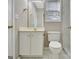 Classic bathroom with white cabinetry, gold fixtures, and a clean, functional design at 355 Woodbyne Dr, Fayetteville, GA 30214