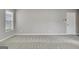 Neutral bedroom with a window and a door at 355 Woodbyne Dr, Fayetteville, GA 30214