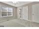 Cozy bedroom with natural light, ceiling fan, and easy access to the en-suite bathroom at 355 Woodbyne Dr, Fayetteville, GA 30214