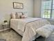 Bright bedroom with soft pink accents, plush textures, and plenty of natural light at 355 Woodbyne Dr, Fayetteville, GA 30214