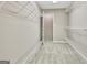 Spacious walk-in closet with installed metal shelving at 355 Woodbyne Dr, Fayetteville, GA 30214