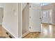 Bright entryway featuring hardwood flooring, an entry door with decorative glass, and access to an upper level at 355 Woodbyne Dr, Fayetteville, GA 30214