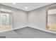 Home gym with grey flooring and access to an adjacent bathroom at 355 Woodbyne Dr, Fayetteville, GA 30214