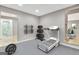 Home gym featuring exercise equipment and access to an adjacent bathroom at 355 Woodbyne Dr, Fayetteville, GA 30214