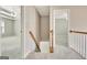 Upstairs hallway with access to multiple bedrooms and a comfortable layout at 355 Woodbyne Dr, Fayetteville, GA 30214