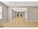 Spacious living room features wood-look flooring, and recessed lights at 355 Woodbyne Dr, Fayetteville, GA 30214