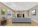 Comfortable living room with decorative shelving, warm lighting, and wood-look flooring at 355 Woodbyne Dr, Fayetteville, GA 30214