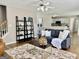 Comfortable living room showcasing a couch, shelving, and view to the kitchen at 355 Woodbyne Dr, Fayetteville, GA 30214