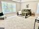 Spacious main bedroom with neutral tones, large window, and tasteful decor at 355 Woodbyne Dr, Fayetteville, GA 30214