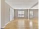 Versatile room with wood-look flooring, window and storage options at 355 Woodbyne Dr, Fayetteville, GA 30214