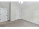Comfortable bedroom with neutral carpet, ample closet space and vaulted ceiling for a relaxing retreat at 74 Riverwood Trl, Grantville, GA 30220