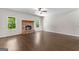 Spacious living area with a brick fireplace, offering a cozy and inviting atmosphere at 74 Riverwood Trl, Grantville, GA 30220