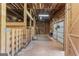 The barn's interior features stalls, storage, and a roll up door at 135 Brookshire Dr, Fayetteville, GA 30215