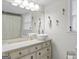 Charming bathroom with vessel sink, modern fixtures, and decorative wall accents at 135 Brookshire Dr, Fayetteville, GA 30215