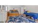 Cozy bedroom featuring two beds, hardwood floors, and a bright, airy atmosphere at 135 Brookshire Dr, Fayetteville, GA 30215