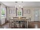 Well-lit dining room with a rustic table and stylish decor at 135 Brookshire Dr, Fayetteville, GA 30215