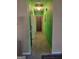 View of hallway with carpeted floors, doors to rooms, and a ceiling light fixture at 106 Garden Trl, Stockbridge, GA 30281