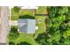 A beautiful aerial view showing the house with well-maintained lawn and trees at 149 Pristine Dr, Locust Grove, GA 30248