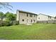A spacious backyard with lush green grass and a privacy fence at 149 Pristine Dr, Locust Grove, GA 30248