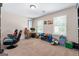 Cozy bedroom features a comfortable desk space near the window at 149 Pristine Dr, Locust Grove, GA 30248
