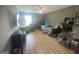 Spacious bedroom with a ceiling fan, natural light, and ample space for a relaxing retreat at 175 Bridgemill Dr, Covington, GA 30014