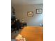 Bedroom area featuring a desk space, wall art, and a plush bed with soft bedding for a relaxing retreat at 175 Bridgemill Dr, Covington, GA 30014