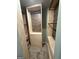 Walk-in closet showcasing custom wood shelving and ample storage space at 175 Bridgemill Dr, Covington, GA 30014