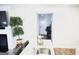 Bright space with kitchen island and a view of the front door at 2845 Long Shadow Ct, Snellville, GA 30078