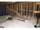 Unfinished attic space with exposed wood beams, insulation, and ventilation systems at 2845 Long Shadow Ct, Snellville, GA 30078
