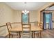 Charming dining area with hardwood floors and natural light at 9706 Holly Hill Way, Jonesboro, GA 30238