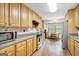 Efficient kitchen with stainless steel appliances and a cozy breakfast nook at 9706 Holly Hill Way, Jonesboro, GA 30238