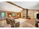 Bright and spacious living room with a fireplace and lots of seating at 9706 Holly Hill Way, Jonesboro, GA 30238