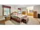 Bedroom suite featuring a bathroom and dresser at 9706 Holly Hill Way, Jonesboro, GA 30238